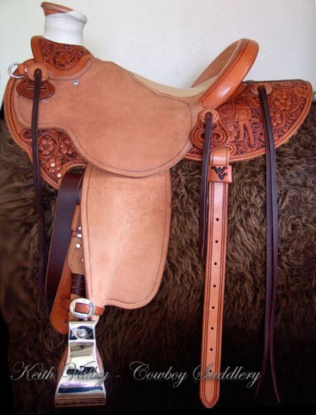 Cowgirl Cate light weight Wade with Orchid Floral tooling.  Contact us about a saddle made just for you like this one.